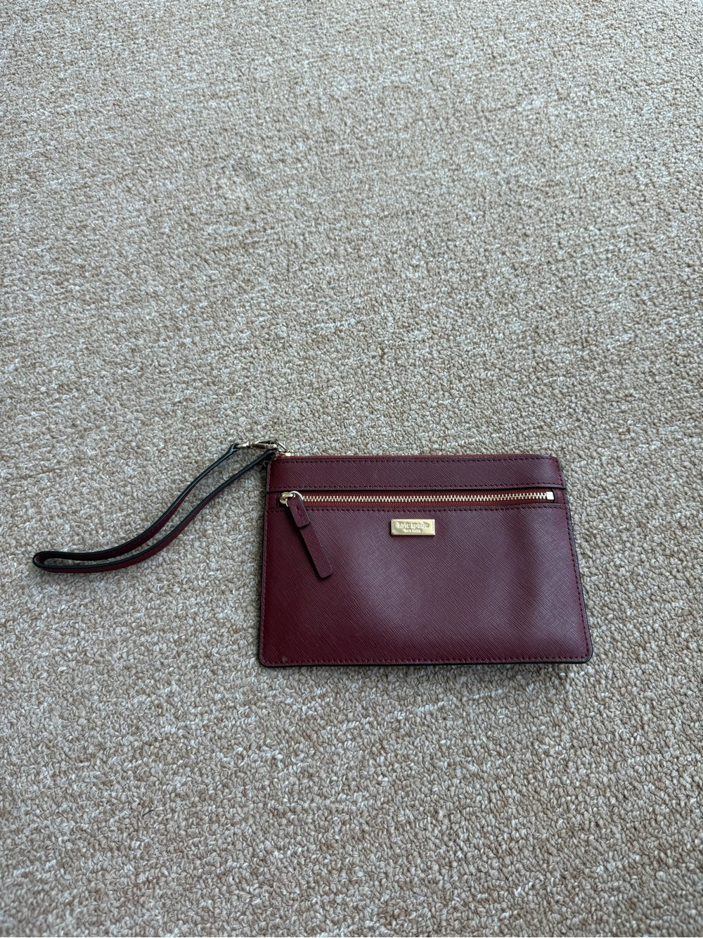 kate spade burgundy leather wristlet clutch with gold hardware